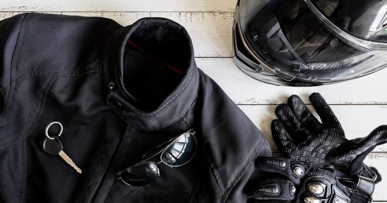 leather jacket gloves and riding helmet